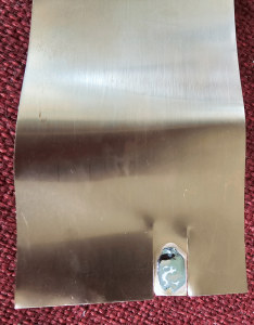 two slits in foil to permit soldering